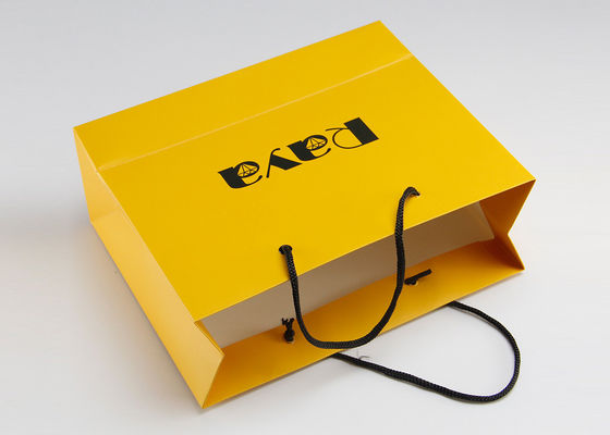 Κίτρινη νάυλον λαβή τσαντών αγορών εγγράφου μεταλλινών και προσαρμοσμένο λογότυπο που τυπώνονται